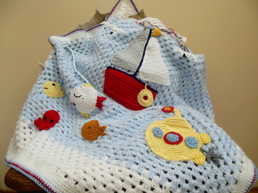 crochet-baby-blanket-with-sailboat-and-sealife-design