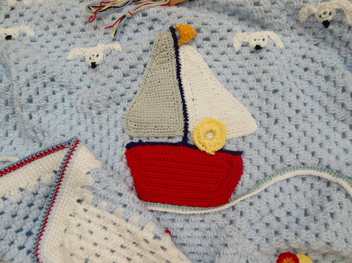 crochet-baby-blanket-with-sailboat-and-sealife-design